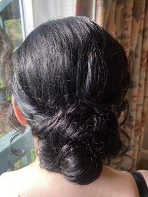 A beautiful bun for this bridesmaid