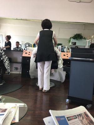 Don't know her name but she's the owner and she always cuts my hair