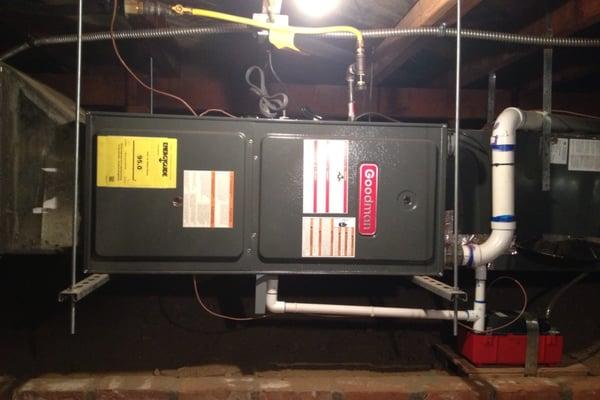 Furnace suspended in the basement.