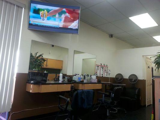 Huge TV to watch if you are getting your hair done.