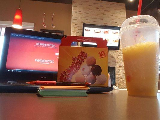 Orange smoothie and assorted timbits yum! Great spot to study