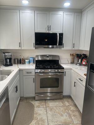 New cabinets installed and can lighting in the kitchen