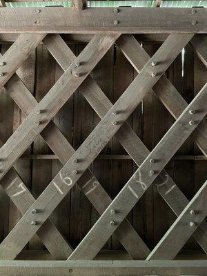 The interior walls of the covered bridge.