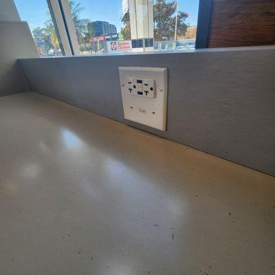 Outlets and USB ports at the counter seats.