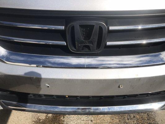 Emblem missing from accident