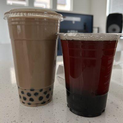 Okinawa Milk Tea (Large), no ice, boba On the Block (Regular), no ice, boba