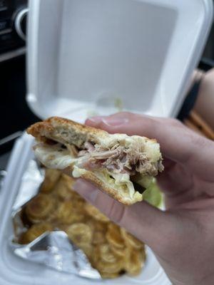 Cross section of the cuban sandwich. Meat is juicy, tender, and full of flavor. Bread is so crispy!