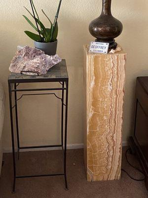 A beautiful piece of lepidolite next to an onyx tower lamp.