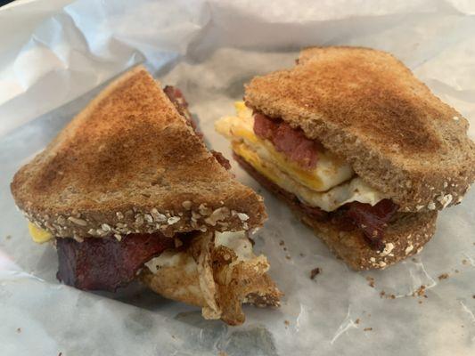 Pastrami with two eggs  fried on wholewheat toast