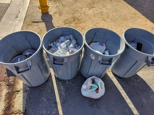 Garbage bins sorted by recyclable plastic.