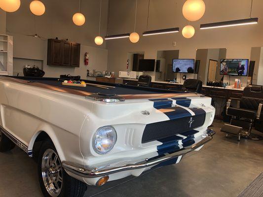 1965 Shelby Mustang pool table to play while you wait.