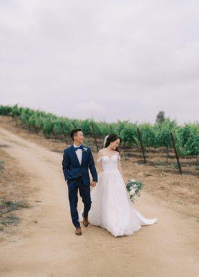 Romantic stroll along the vineyards. Somehow, Amy worked her photography magic to make this overcast day look super romantic and magical.