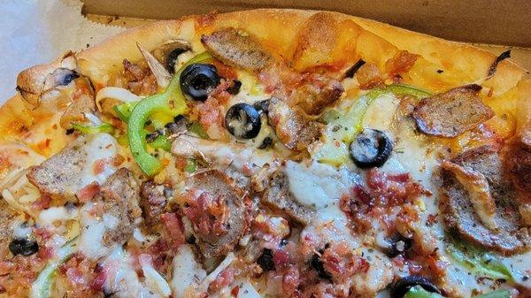 Close up of the Ultimate Boss , pizza perfection