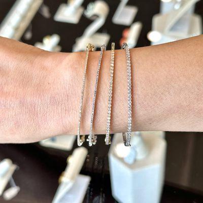 A beautiful alternative to diamond tennis bracelets are stackable diamond bangles available in 14KT white, yellow or rose gold. Bestsellers!