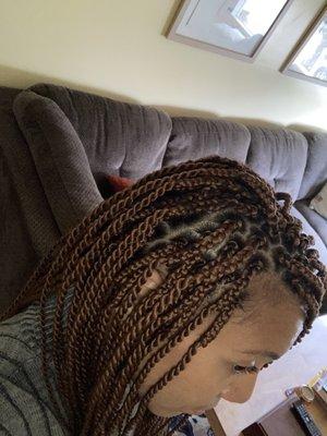 Due to my hair being short she braided it down to my length than twists. I like the style.