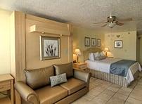 Enjoy contemporary Florida style in this bright and breezy hotel room. A private furnished balcony beckons you to relax in th...