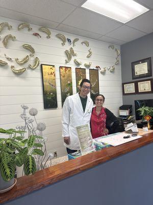 Dr Palmer and Michael mark with pretty koi background