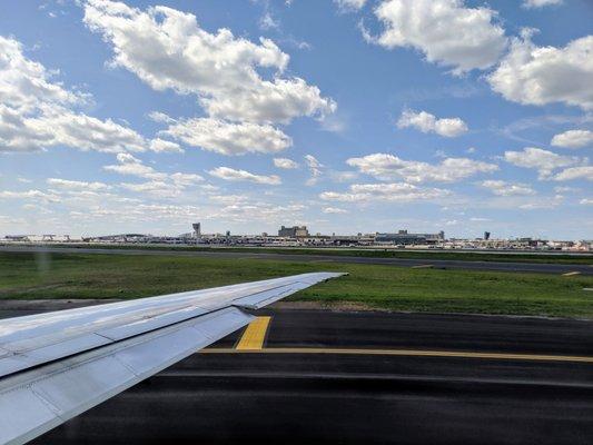 View of Philadelphia International Airport from inside a Delta MD90 from the runway area.