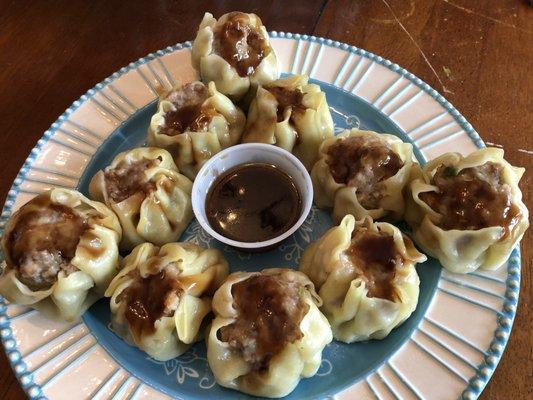 Prefer the Dim Sum over the standard dumplings.  Beef/Chicken/Pork mix in thin skin with a flavorful sauce on the side. Order 2 or more.