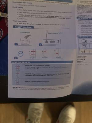 Photo of pills put in water and then tested on a fentanyl test strip coming out positive