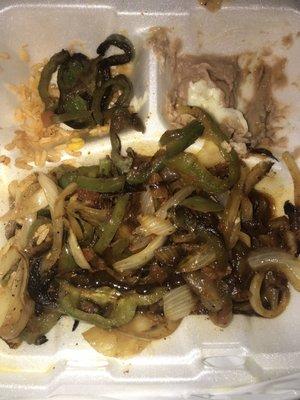 A mound of peppers and onions that was supposed to be my "steak fajitas"