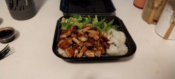 Chicken teriyaki,  salad, edamame, and California rolls.