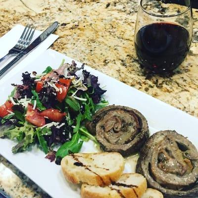 Sirloin Beef Pinwheels-Stuffed with prosciutto and mozzarella enjoying with a glass of Montepuliciano and a side salad