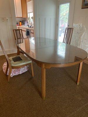 Here piece glass table cover for an extendable table