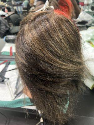 Weaved highlights on dark brown hair by student Kel aka CL.  Instructor: Ms. Cortney