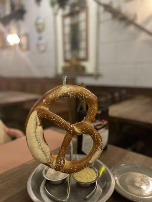 Giant pretzel with dipping sauces