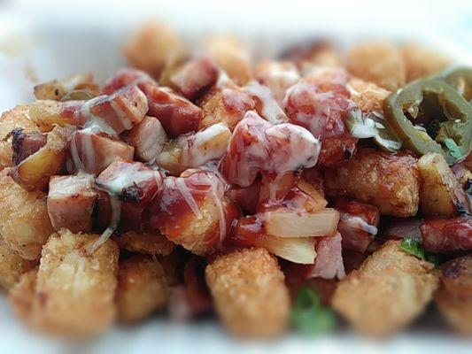 Hawaiian BBQ Tots: Ham, Swiss cheese, pineapple, green onions, jalapenos & Hawaiian BBQ sauce