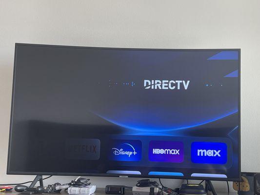 TV laid on side in huge box with metal items, screen broken on left side