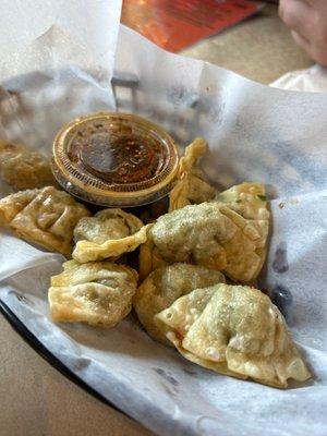 Fried chicken cilantro dumplings.  A great app!