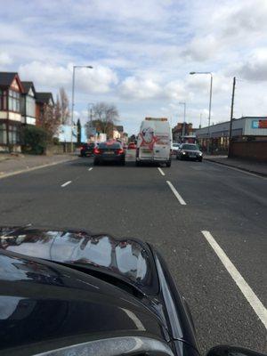 Racing off overtaking traffic on the wrong side of the road.  Unread