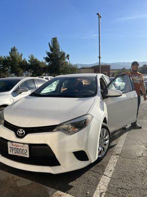 Ready to go customer with his new Toyota Corolla