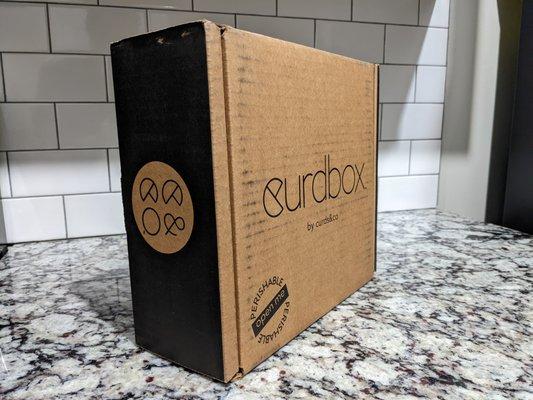 January 2022 Curdbox. Unboxing photo, 1 of 5. Outside the box.