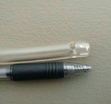 This photo shows the clean water inflow nozzle compared to an average pen. The actual outer diameter of the nozzle is 3/8 inch.