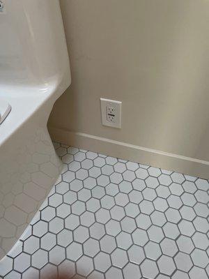 They installed an outlet near our toilet for a future bidet.