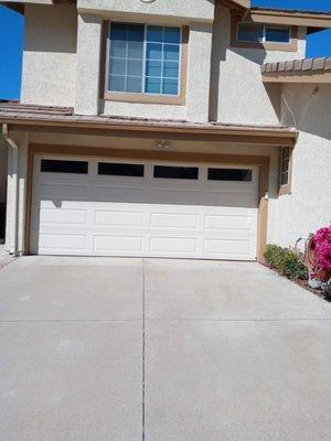 New Tilt-Up Steel Garage Door same color to match the new paint job