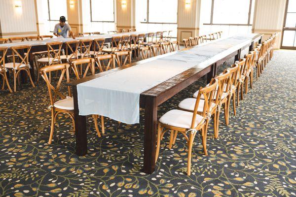 Cross back wooden chairs are perfect for weddings