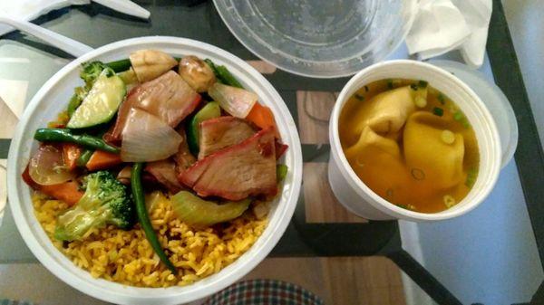 Roast pork with chinese vegetable lunch special with pork fried rice and wonton soup.