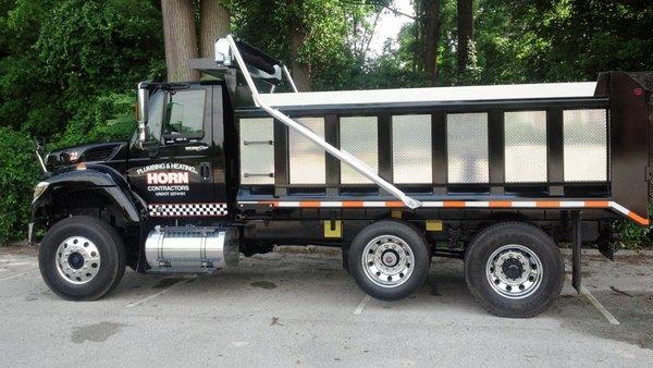 A Horn Plumbing & Heating Inc. 'Sewer and Water Division' dump truck all cleaned up and ready to go to work