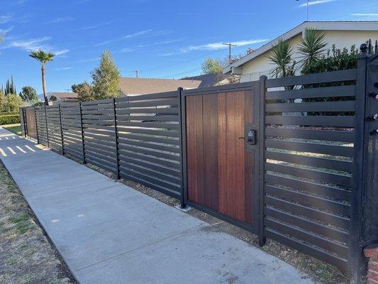 Pedestrian gate with digital lock.