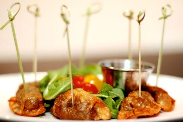 Shrimp Dumplings; served with soy chive sauce