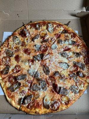 Sausage and pepperoni pizza