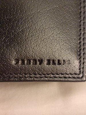 Label on Black Wallet