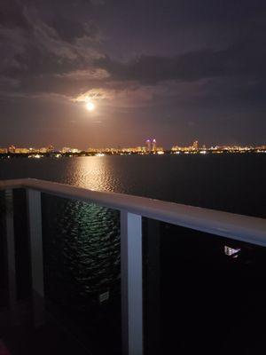 Looking at the full moon over Miami Beach from our balcony in NBV.