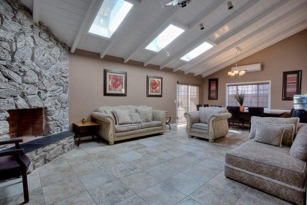 Spacious and sun-filled living room.