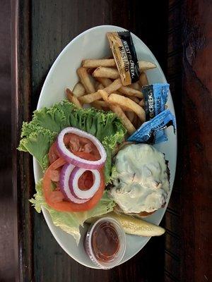 Swiss Cheese and mushroom burger,with tomato,lettuce,red onions,pickles and a side of fries.OMG!