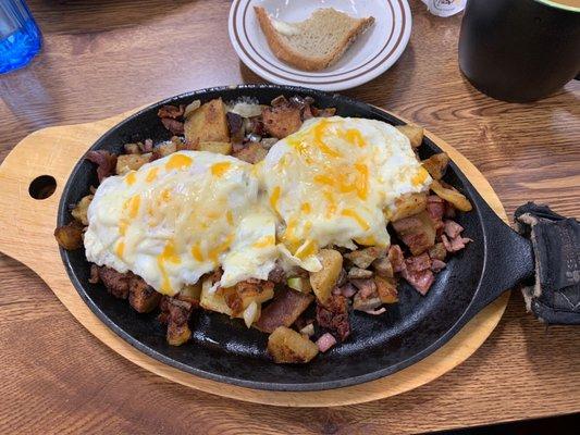 Over easy cheesy egg meat lovers skillet